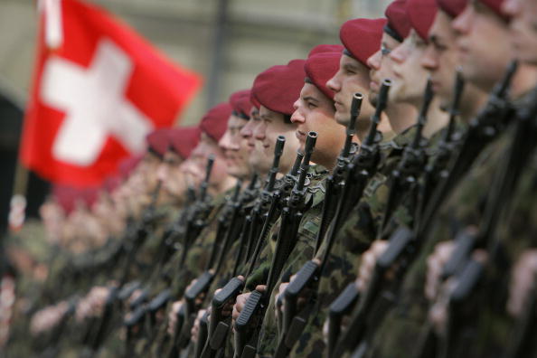 A Swiss Army honor guard at a welcoming ceremony for Czech President Vaclav Klaus in Bern, 22/03/2006. (FABRICE COFFRINI/AFP via Getty Images) Image (AFP 57154223, Par672009) licensed by Getty Images to Richard Lutz (HRCA) for editorial use.